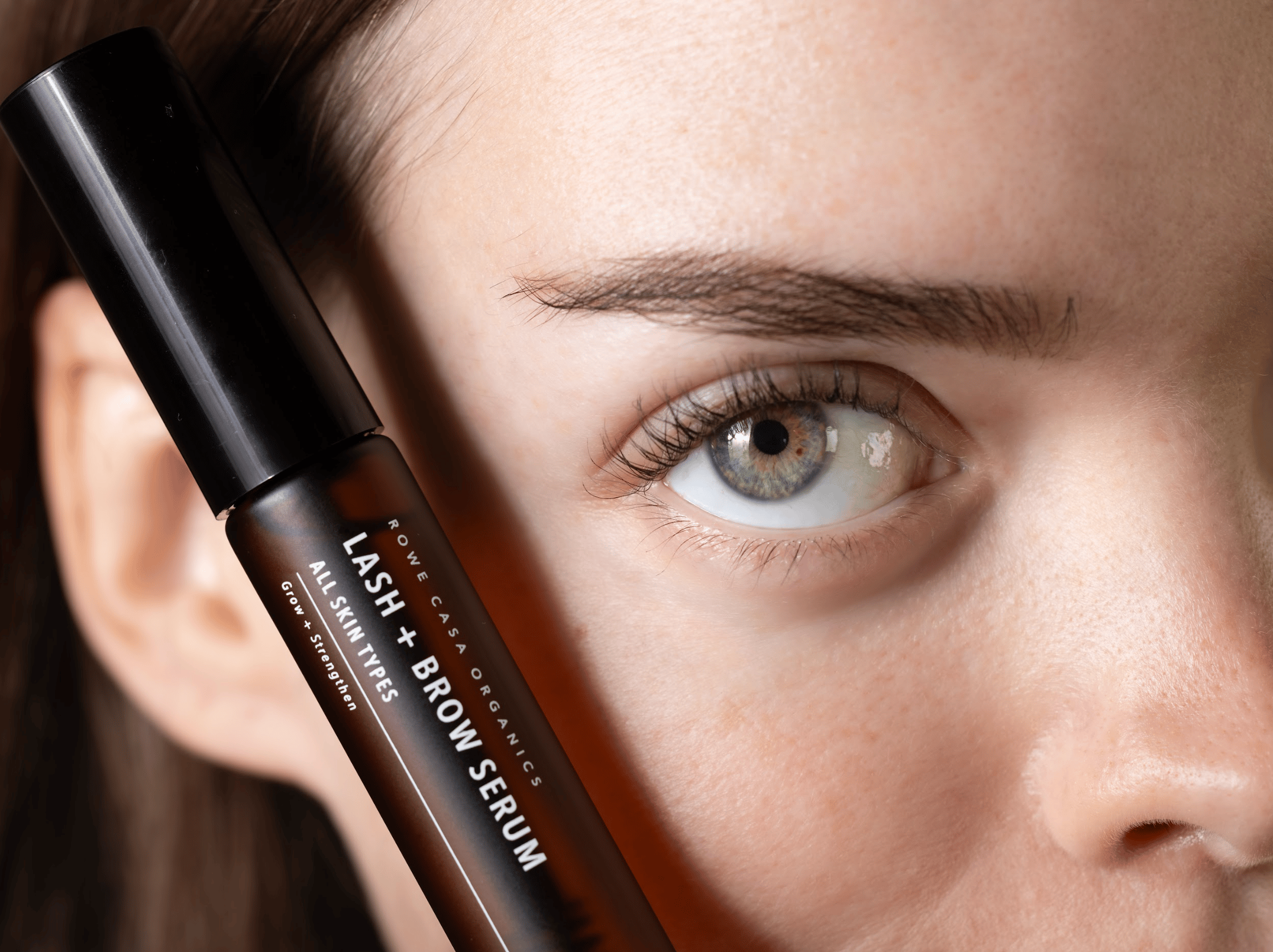 Person sitting by window working on tablet