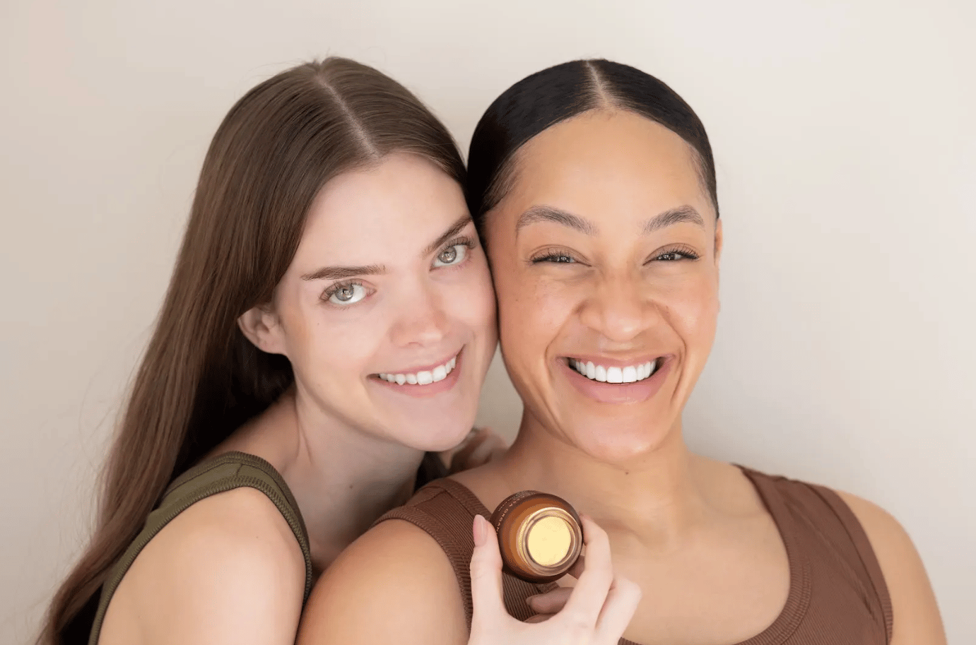 Person sitting on couch working on laptop